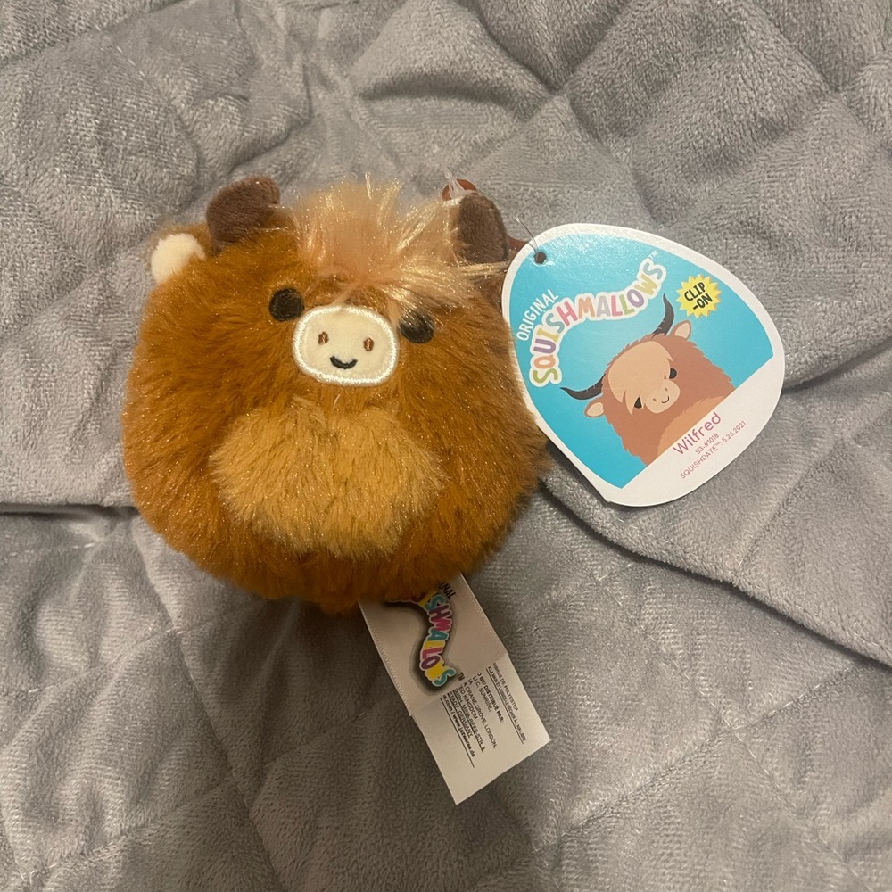 Fuzzy wilfred squishmallow clip